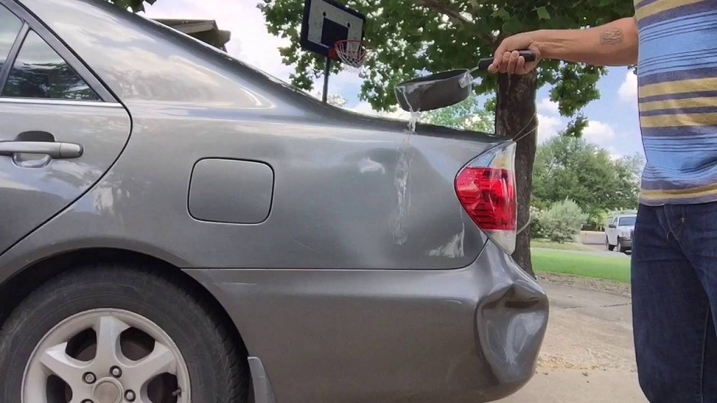 How to remove car dent with boiling water