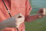 Close-up of fishing knot securing line to a lure for maximum strength
