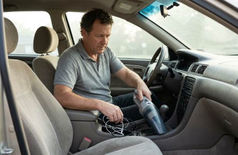 Austin gig driver cleaning a vehicle dashboard before work